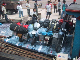 Four bikes on a cargo boat