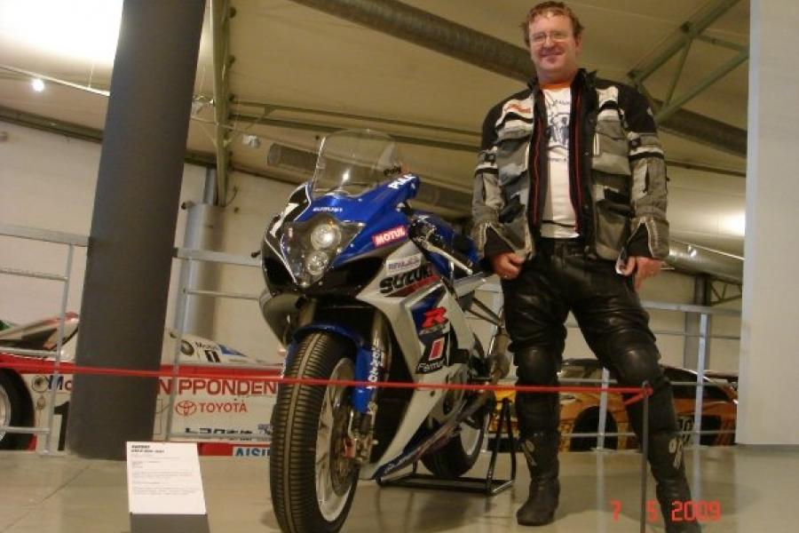 posing next to a race winning GSXR1000